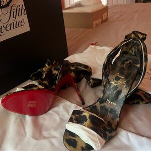 Louis Vuitton. Brand new, never worn. Leopard tie heel size 10
